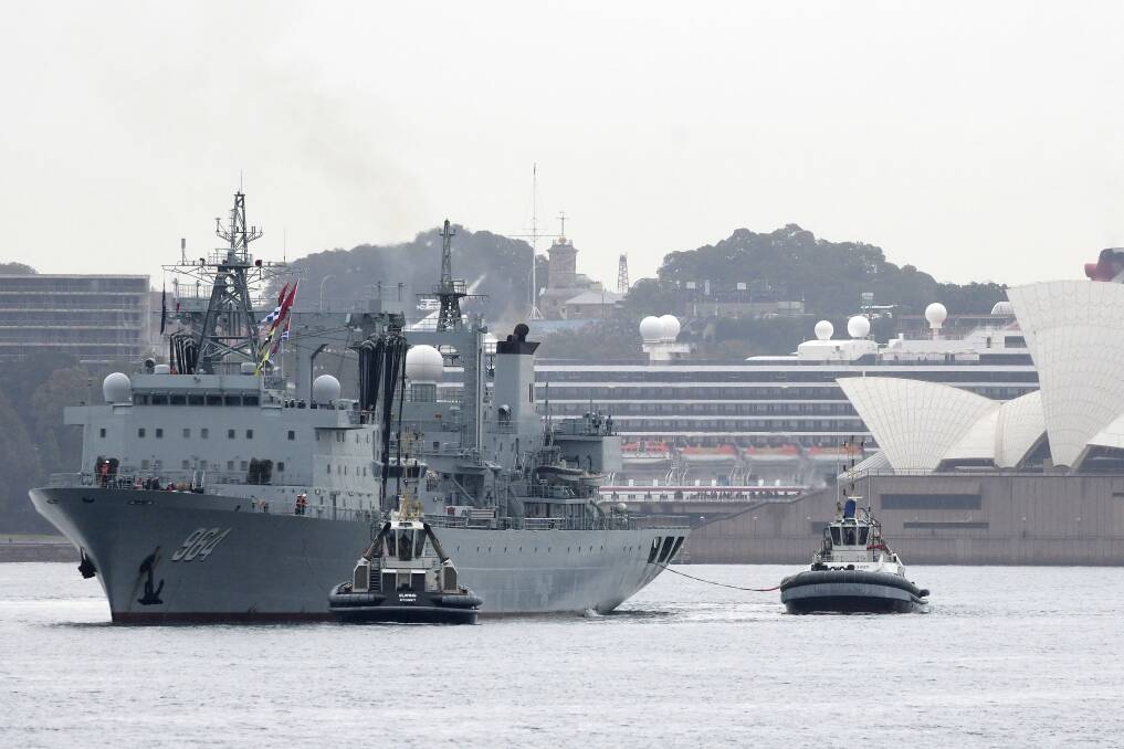 Surprise visit: A Chinese naval ship departs Sydney Harbour on Friday, June 7. Three Chinese navy ships made the unannounced four-day visit to Sydney. Picture: AAP