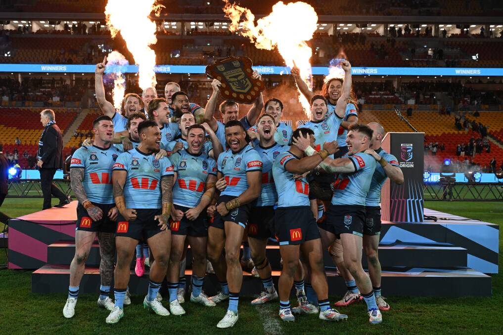 NSW players celebrate with the Origin shield. Picture Getty Images