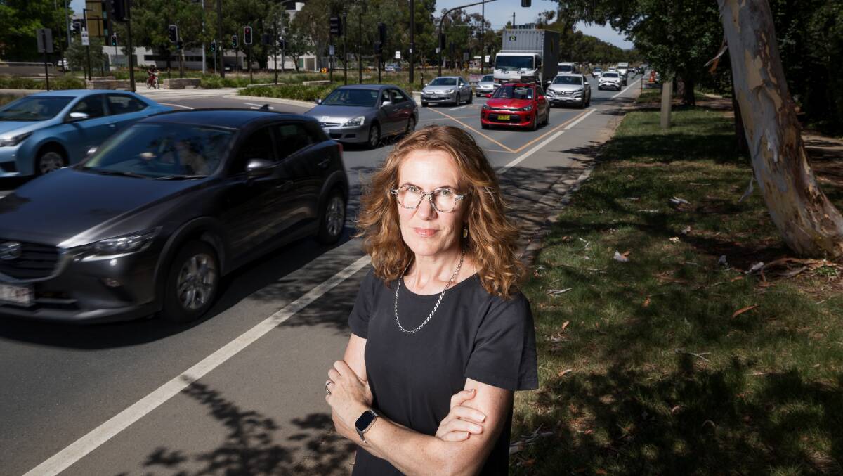 Joanne Pybus at the spot on Northbourne Avenue where her husband was hit by a car while cycling. Picture by Sitthixay Ditthavong