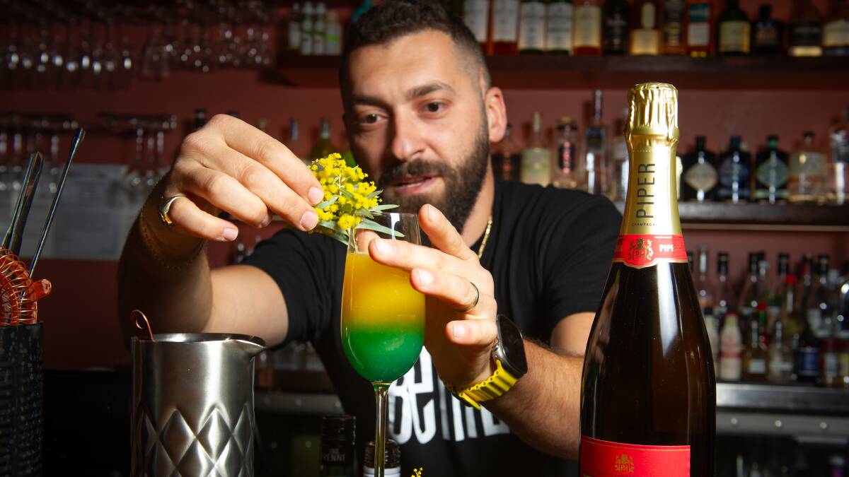 Bar Beirut owner Soumi Tannous, with his creation, The Matilda Mimosa. Picture by Elesa Kurtz