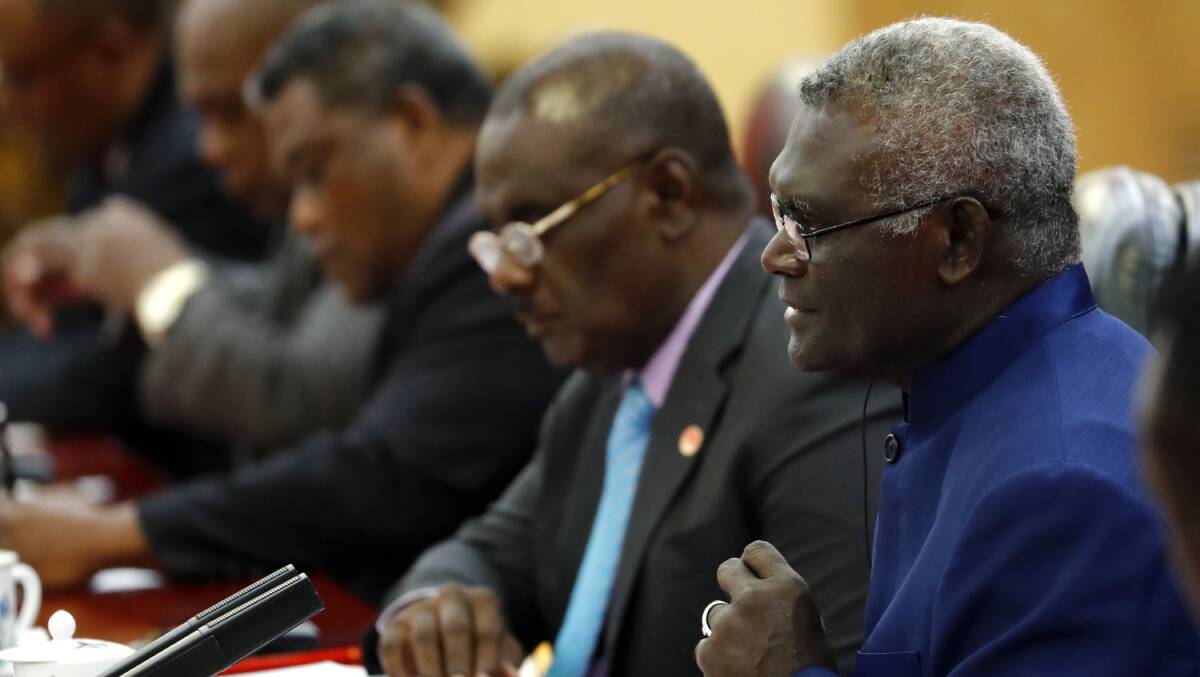 Solomon Islands Prime Minister Manasseh Sogavare (right) will meet with Anthiny Albanese in Canberra. Picture Getty Images