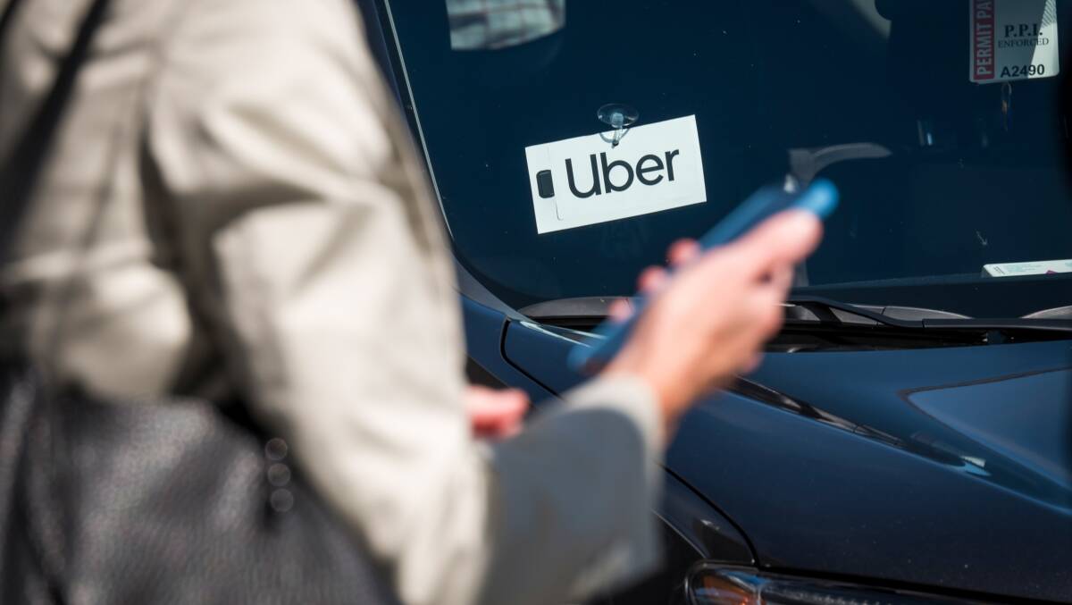 Uber has given its Australian drivers a pay cut. Picture Shutterstock