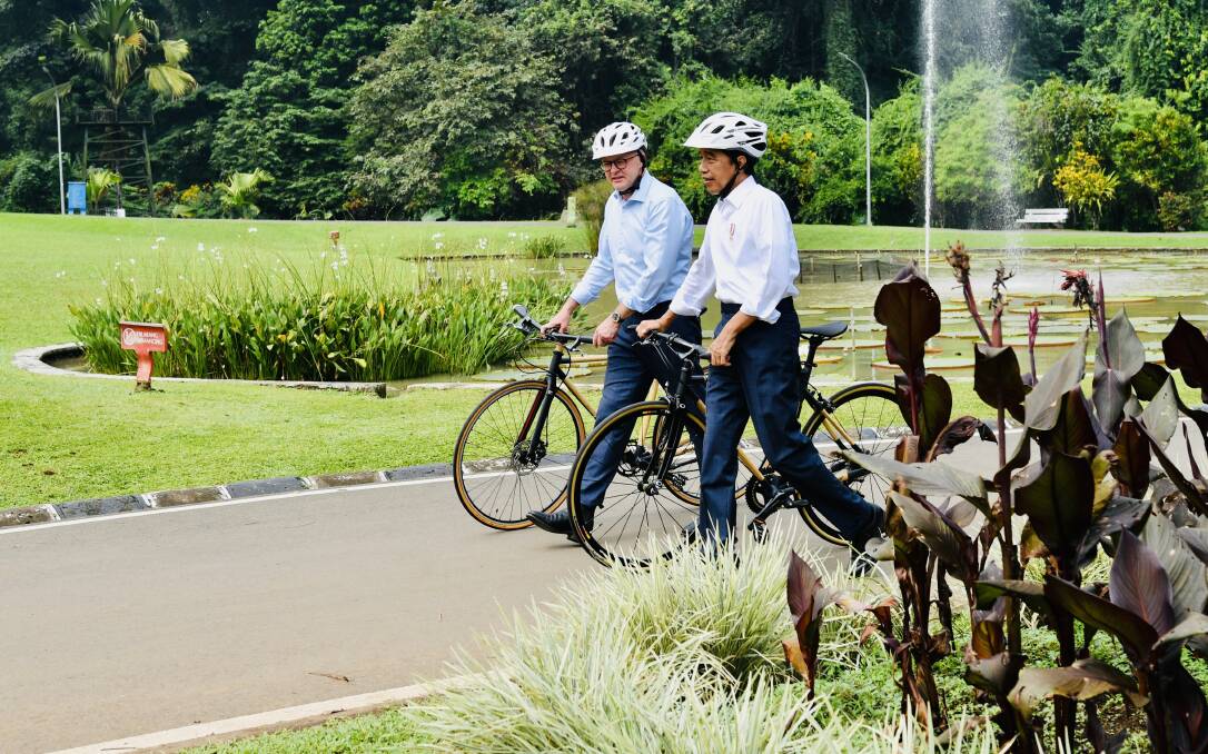 Anthony Albanese and Joko Widodo rode bikes in Jakarta. Picture Getty Images