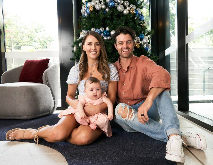 Rhiannon and Callum Ferguson enjoy their first Christmas with five-month-old Layla in the Canberra BBL bubble. Picture: Matt Loxton