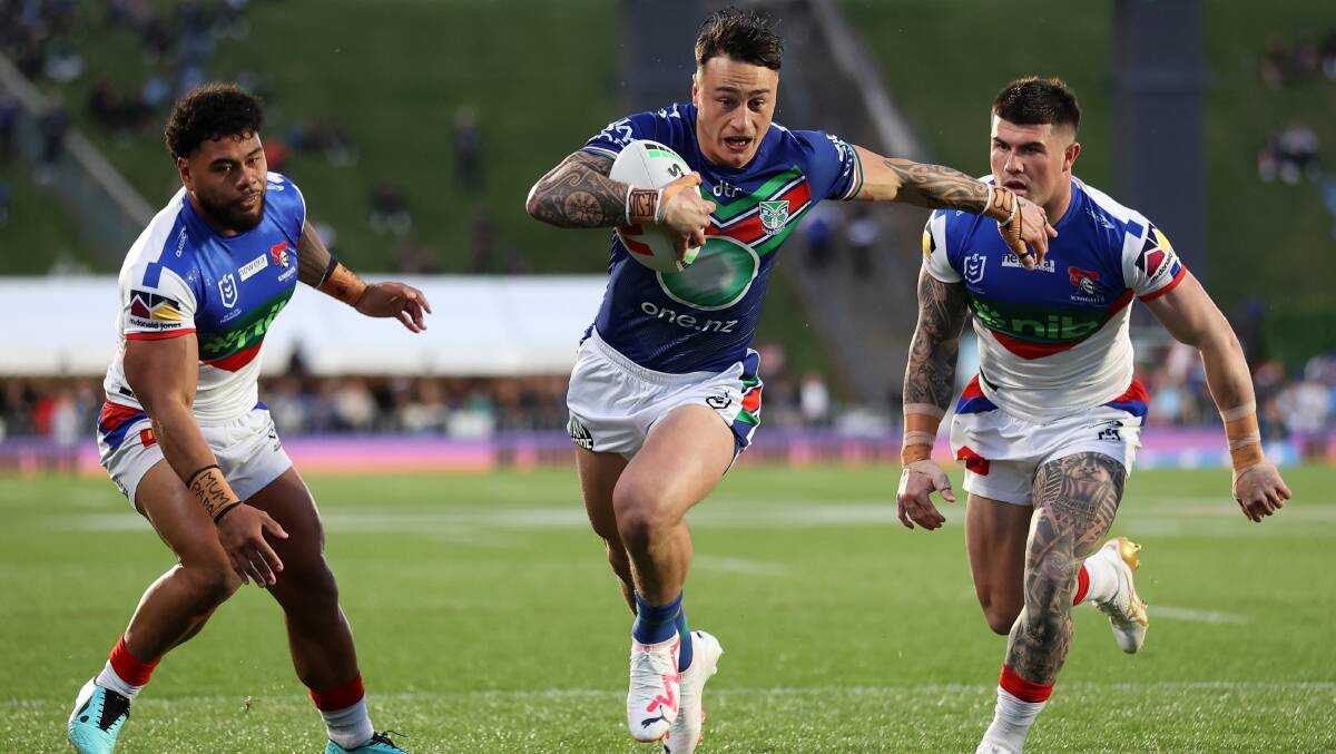 Warriors fullback Charnze Nicoll-Klokstad breaks the Knights' defensive line to score a try in their semi-final win last weekend. Picture Getty Images