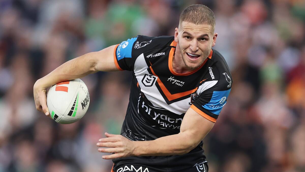 Tigers centre Adam Doueihi scored a try in his first NRL game in more than a year. Picture Getty Images
