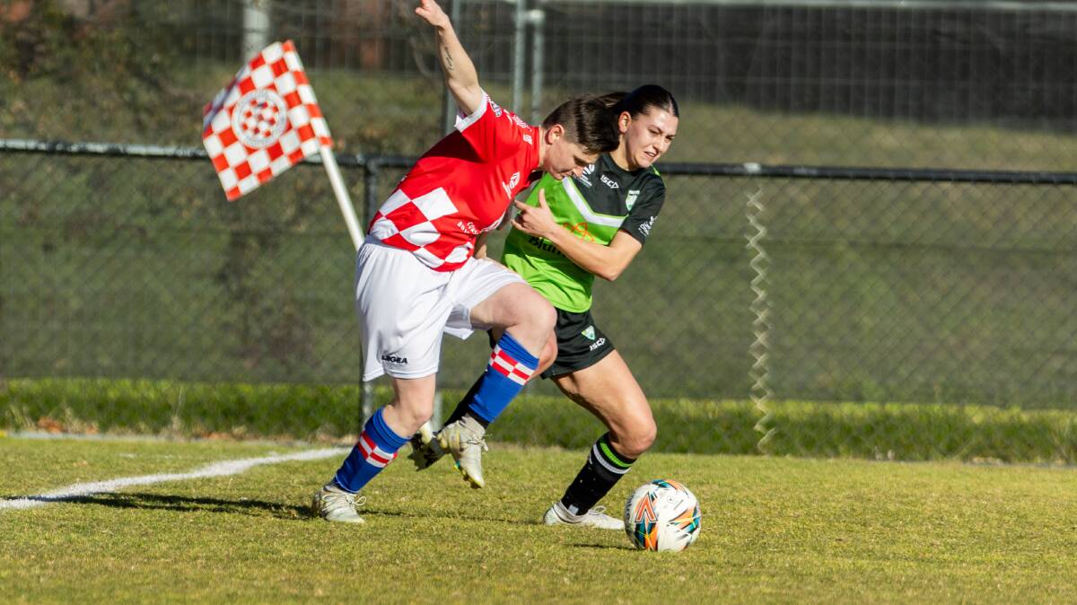 CU Academy's Rhiannon Fenson tackles Croatia's Sofia Christopherson in a tight 2-all draw. Picture by Gary Ramage