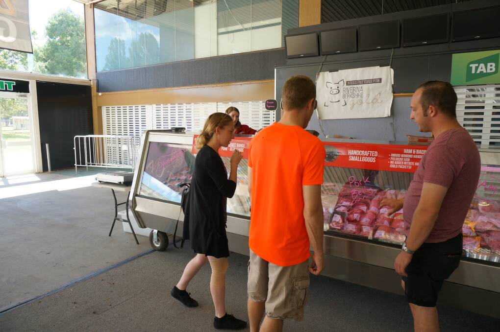 Shoppers at the soft opening for the Northside Family Farmers Market. Photo: Supplied