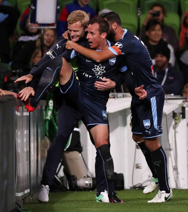 Luke Wilkshire celebrates his winning goal for Sydney FC. Photo: AAP