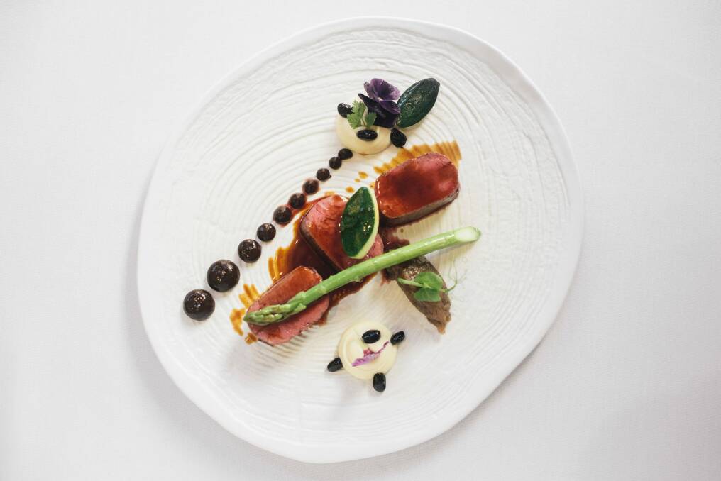 Restaurant review at Courgette on Marcus Clarke st. Cowra grass fed lamb, sweet smoked eggplant, white bean puree, prune gel, and rosemary jus Photo: Rohan Thomson