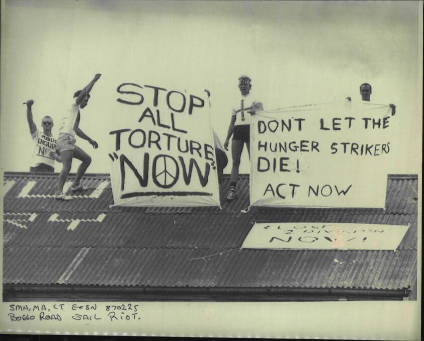 Prisoners on the roof of Boggo Road during the 1987 protests. Photo: Fairfax Archives