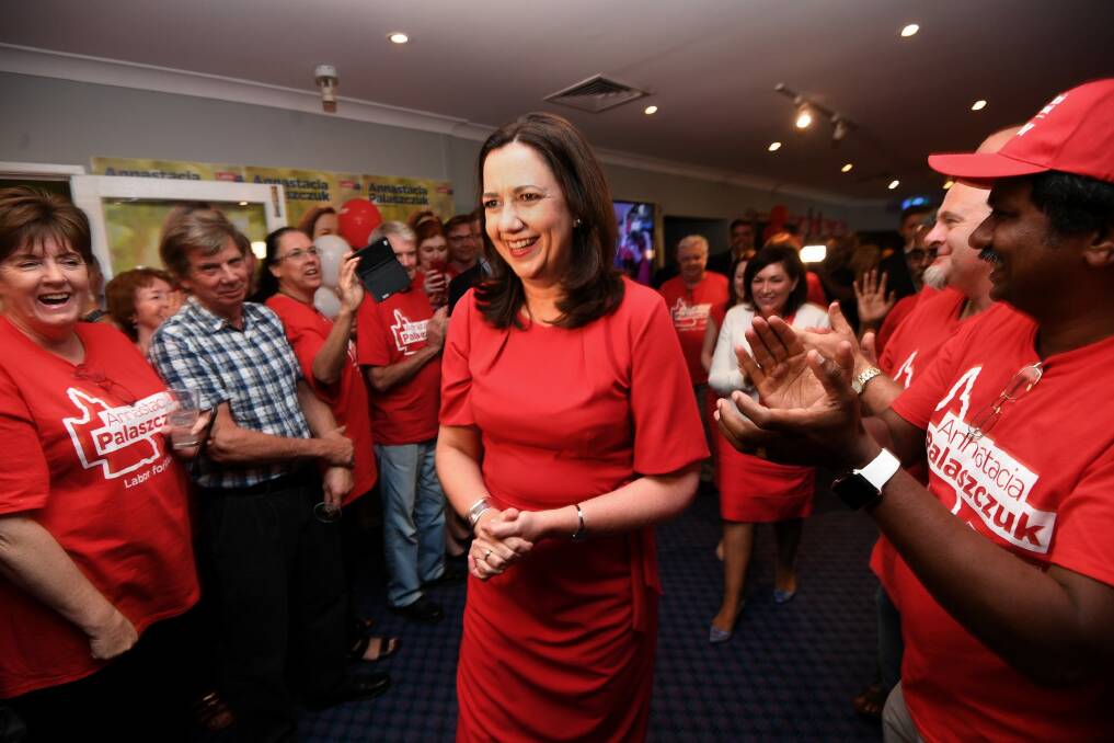 Annastacia Palaszczuk is congratulated by supporters as she edges towards retaining government in Queensland.