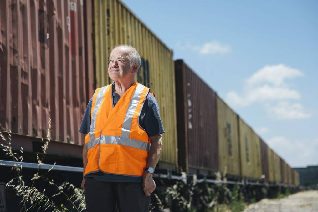 Corporate services manager of the Canberra Rail Museum, Bruce Blain with freight being loaded to leave Canberra by rail.  Photo: Rohan Thomson