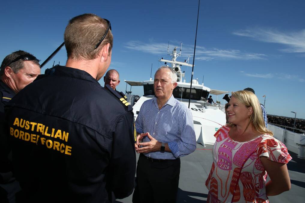 Prime Minister Malcolm Turnbull with local member Natasha Griggs aboard the Cape Jervis patrol vessel in Darwin on Tuesday. Photo: Andrew Meares