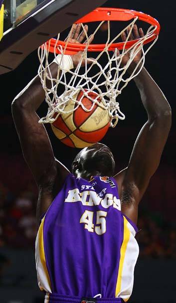 Grand slam ... Jerai Grant scores for the Kings last night. Photo: Getty Images