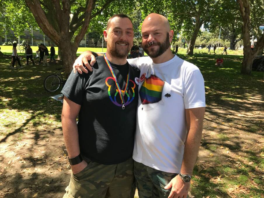 "The financial implications of marriage are massive," says Stephen Green (wearing black shirt), with partner Ian Wall. Photo: Clare Colley