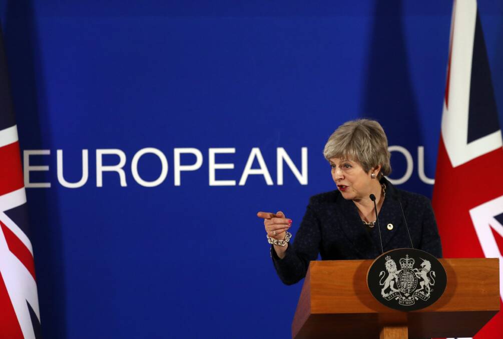 Theresa May said the EU summit outcome "underlines the importance of the House of Commons passing a Brexit deal next week so that we can bring an end to the uncertainty and leave in a smooth and orderly fashion". Photo: AP