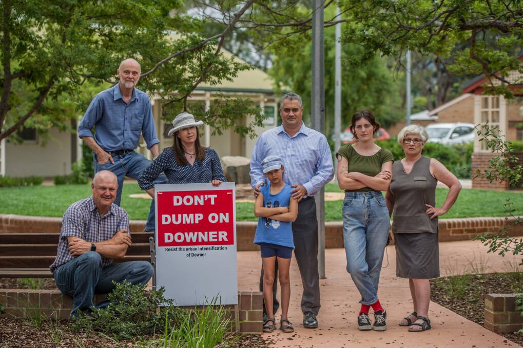 Downer residents Miles Boak, Steve Dyer,  Suzanne Pitson, Geoff and Kate Francis, Jessica Wade and Sue Dyer are concerned about a new ACT planning strategy which proposes to increase housing density in the suburb Photo:  Karleen Minney