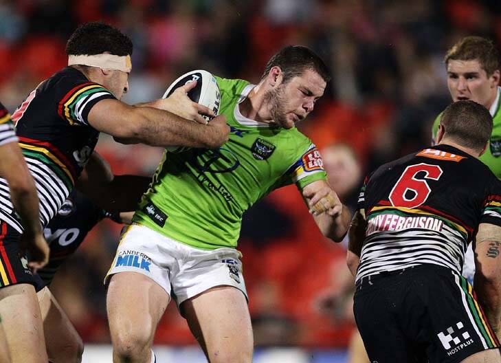 Lucky escape ... Canberra Raiders lock Shaun Fensom, playing against the Penrith Panthers, avoided a serious operation to remove his kidney. Photo: Getty Images