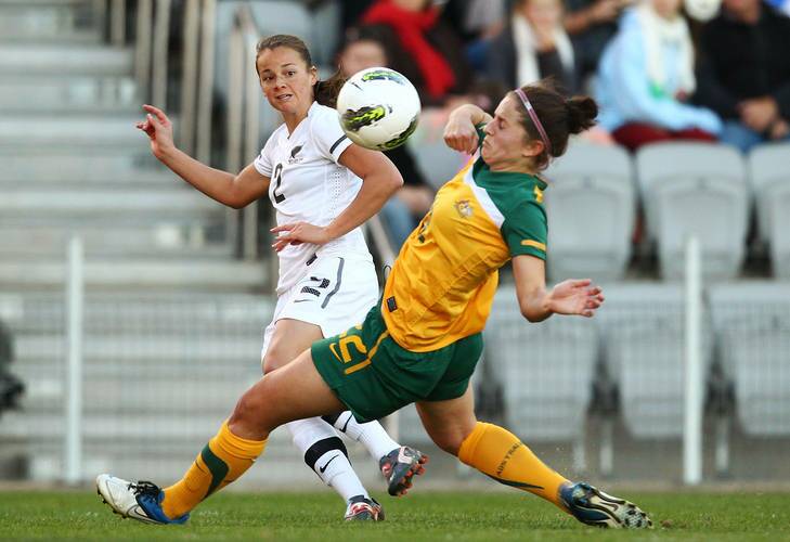 Ria Percival of New Zealand kicks the ball into the face of Ellie Brush of Australia during the women's international friendly match between the Australian Matildas and New Zealand at WIN Stadium on June 24, 2012 in Wollongong, Australia. Photo: Getty Images