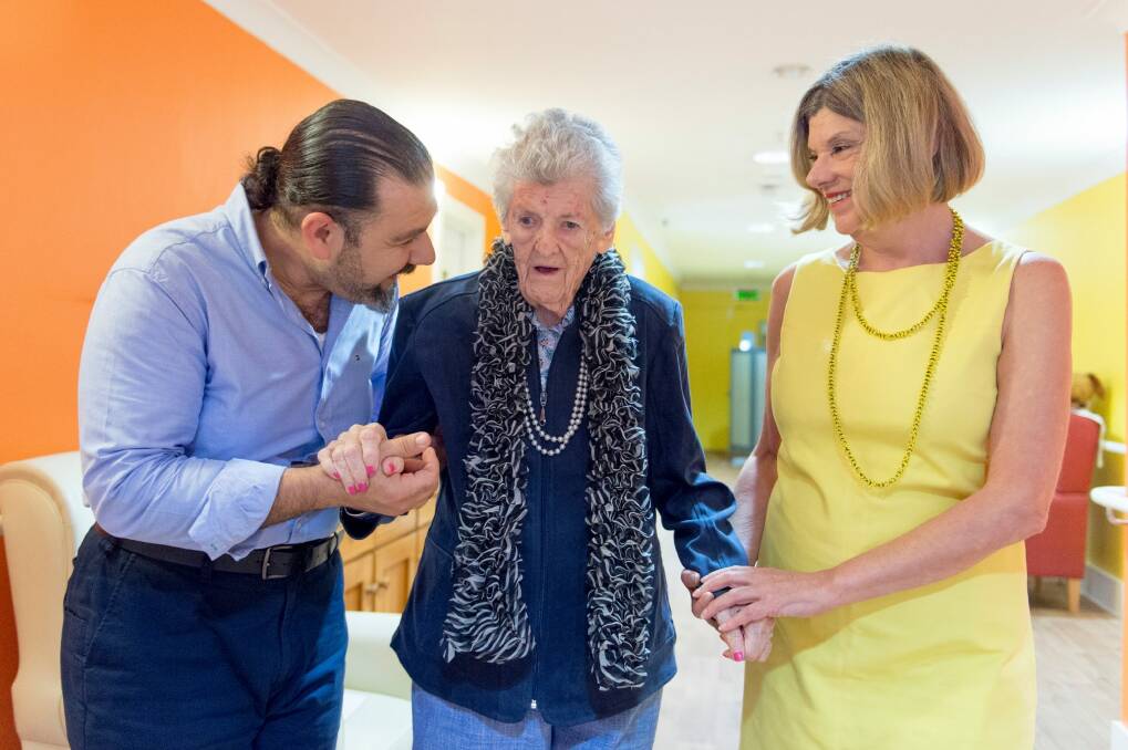 Carer Ahmed Selah with dementia sufferer Sue and daughter Amanda Jackson in an Australia-first dementia program at Mountain View Aged Care Plus centre. Photo: Jay Cronan