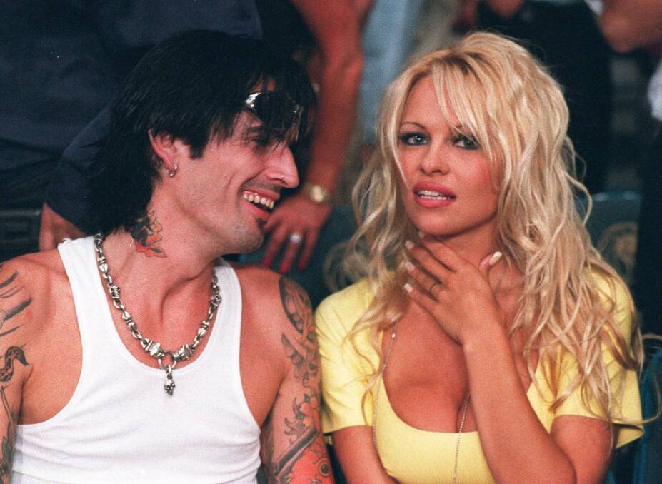 Tommy Lee in 1995 with then wife Pamela Anderson. The couple divorced in 1998. Photo: AP