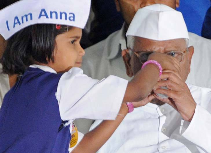 It's over ... Anna Hazare breaks his fast with a glass of juice. Photo: Indranil Mukherjee 