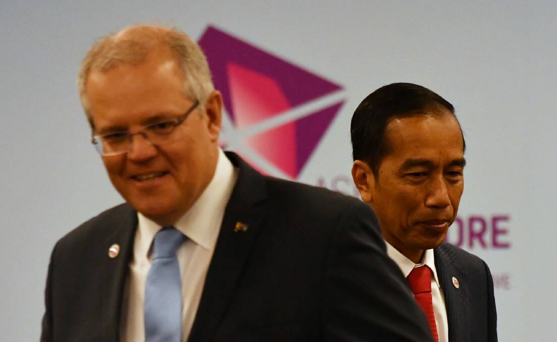 Prime Minister Scott Morrison and Indonesian President Joko Widodo at a bilateral meeting during the 2018 ASEAN Summit in Singapore, last week. Photo: AAP