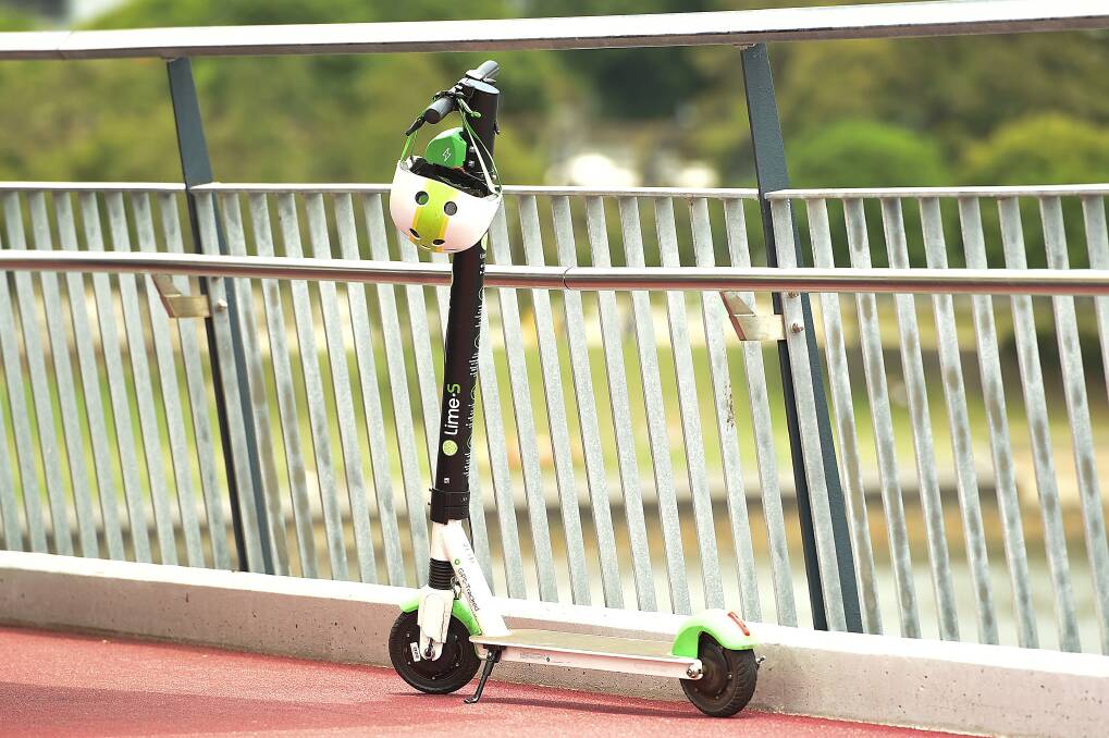 Love them or loathe them, more than 131,000 riders have signed up to ride Lime scooters in Brisbane. Photo: AAP