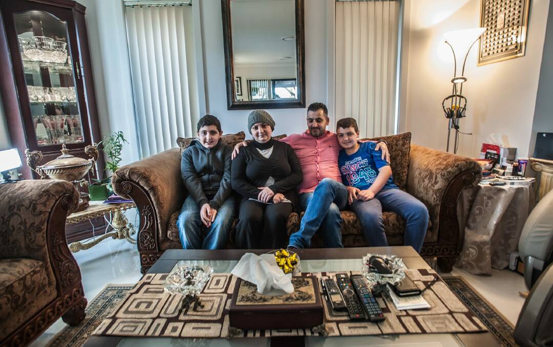 Wahiba Omran, who was diagnosed with multiple sclerosis 12 years ago, with her husband Mohamed Charara and sons Ali, 14, and Tarek, 12. Photo: Karleen Minney