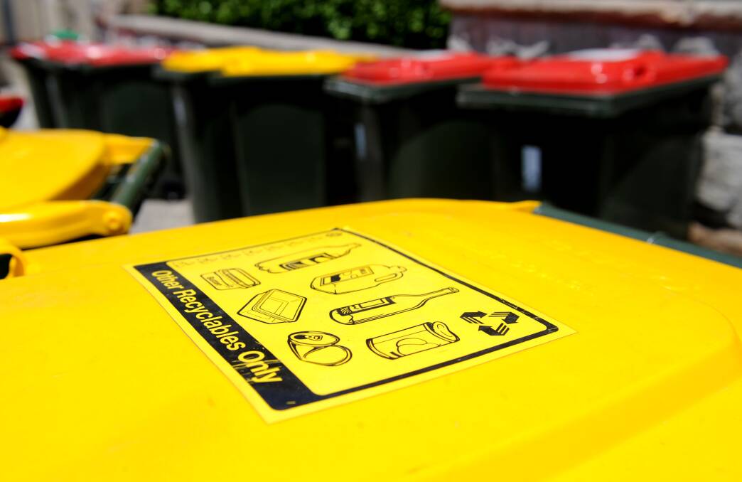 Ipswich City Council will now dump recyclables placed in yellow top bins into landfill. Photo: AAP Image/ Tracey Nearmy