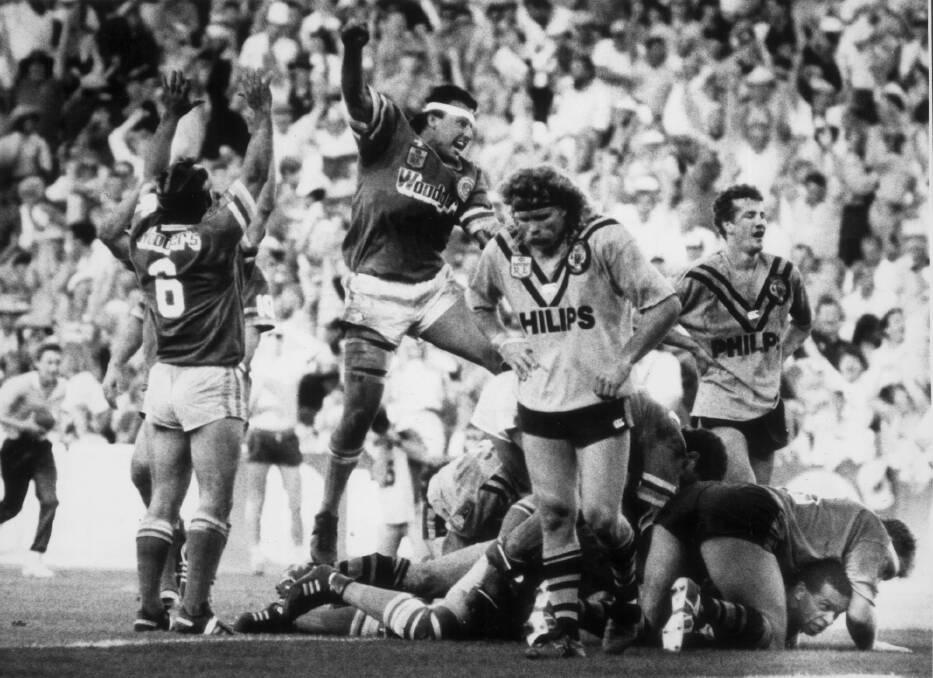 Hail Mary play: The Raiders celebrate the try by John Ferguson that sent the 1989 grand final into extra time. Photo: Steve Christo