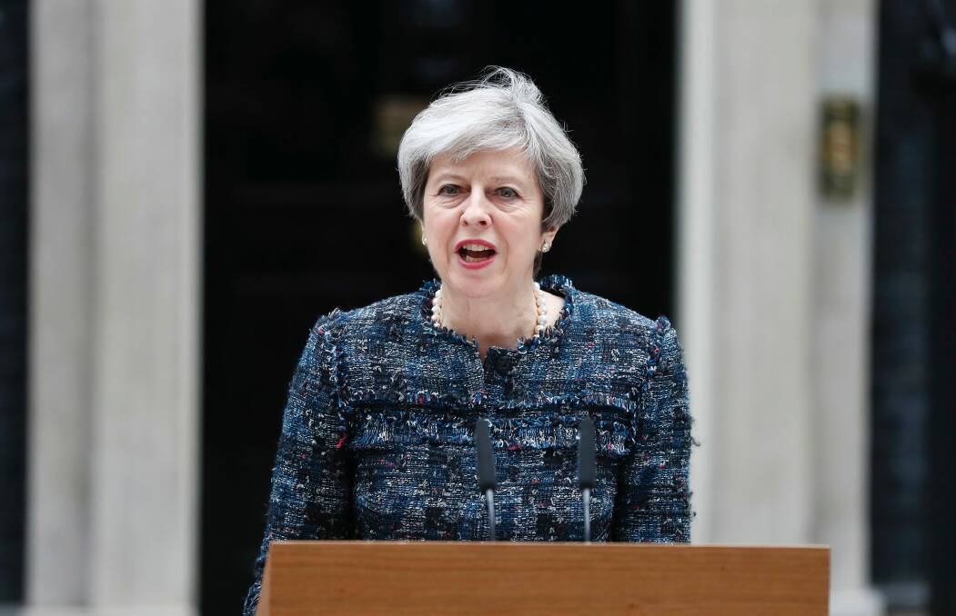 British Prime Minister Theresa May speaking to the media outside 10 Downing Street after asking the Queen to dissolve parliament ahead of the election. Photo: Kirsty Wigglesworth