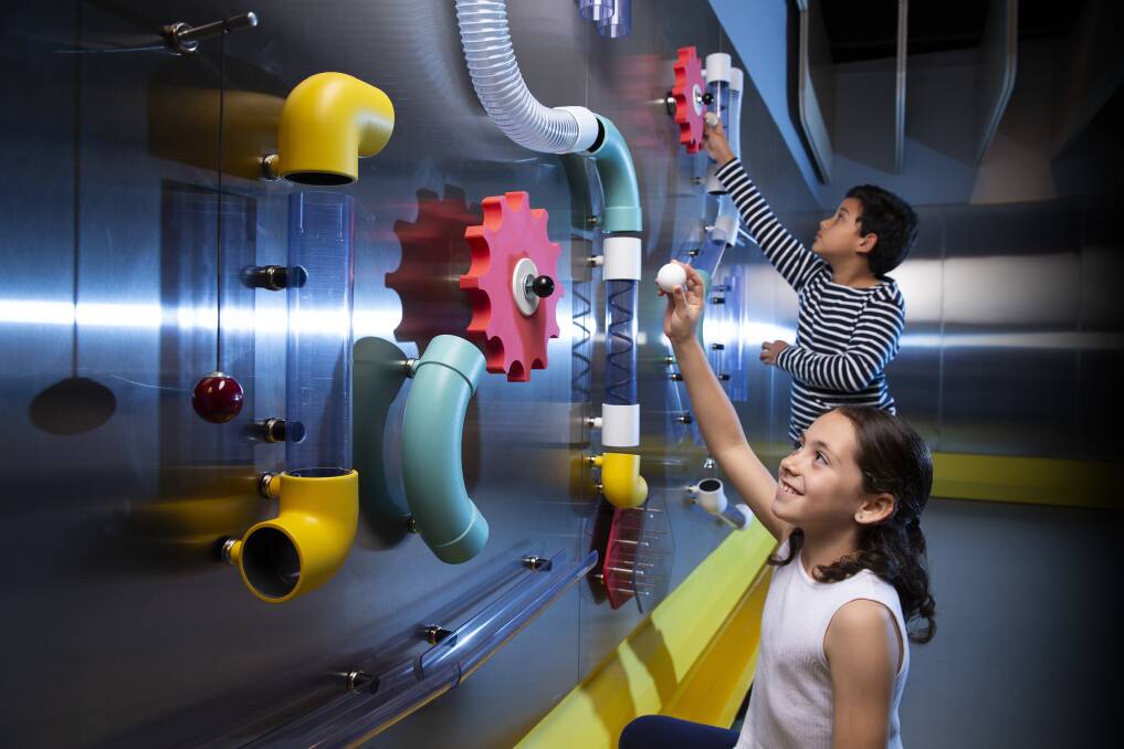 The Gravity Run exhibit allows visitors to test out different consequences of gravity. Photo: Queensland Museum