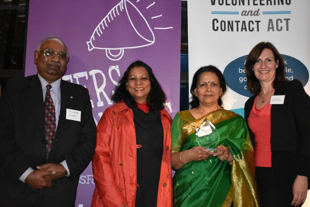 Arvind Gupta, Kamala Smith and 2017 Volunteer of the Year award winner Jayanti Gupta in green. Photo: Volunteering and Contact ACT