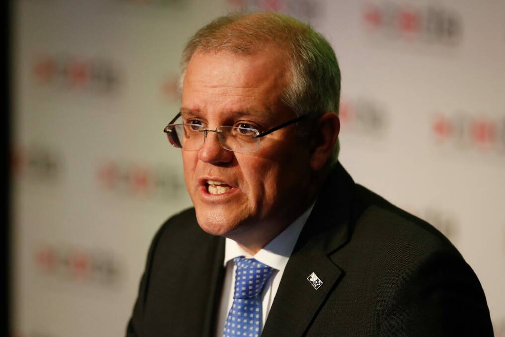 Treasurer Scott Morrison says the Australian Prudential Regulation Authority and the Australian Securities and Investment Commission are trying to take the heat out of the housing market. Photo: Alex Ellinghausen