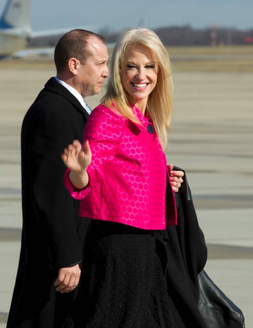 Counselor to President Kellyanne Conway waves to the media before President Donald Trump's arrival at Andrews Air Force One. Photo: Jose Luis Magana