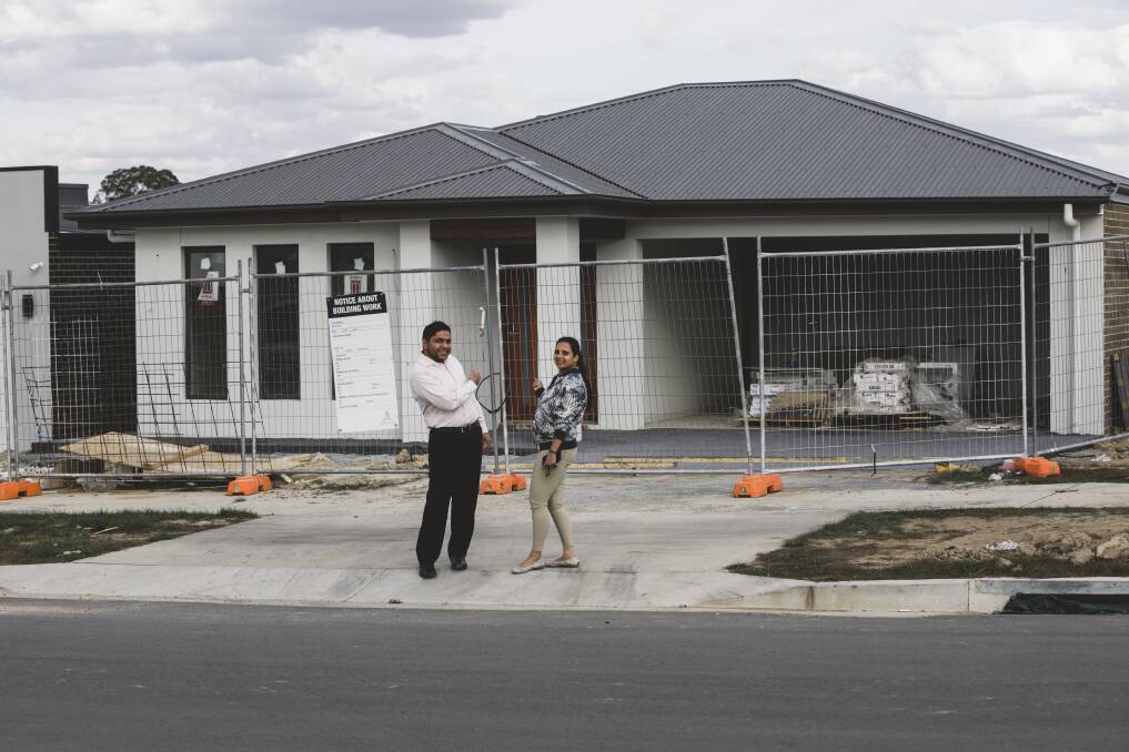 If all goes to plan, first home-buyers Varun Vashisht and Deepali Shukla will be the first residents in the new suburb of Taylor by the end of May. Photo: Jamila Toderas