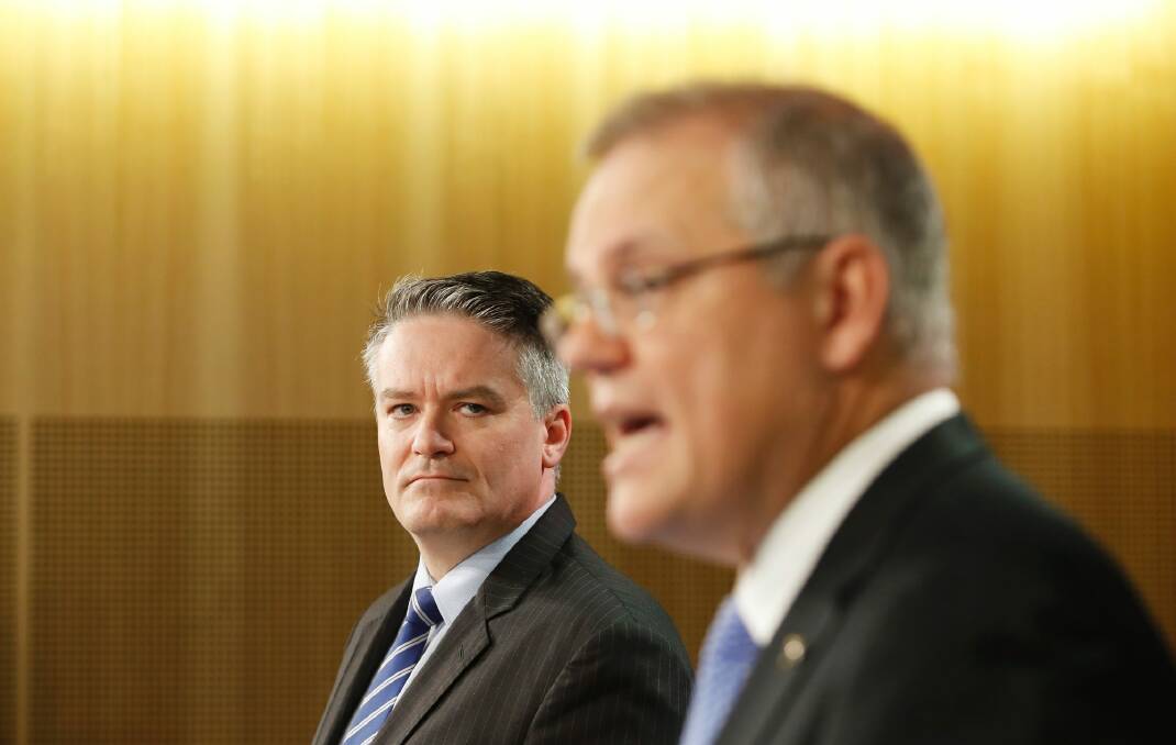 Scott Morrison and Mathias Cormann need to take on Australia's debt problem. Photo: Daniel Munoz
