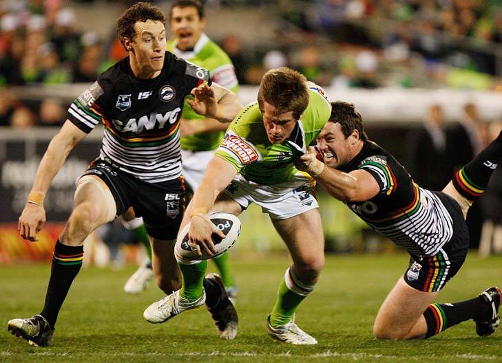 Trying hard ... Josh McCrone scores. Photo: Getty Images