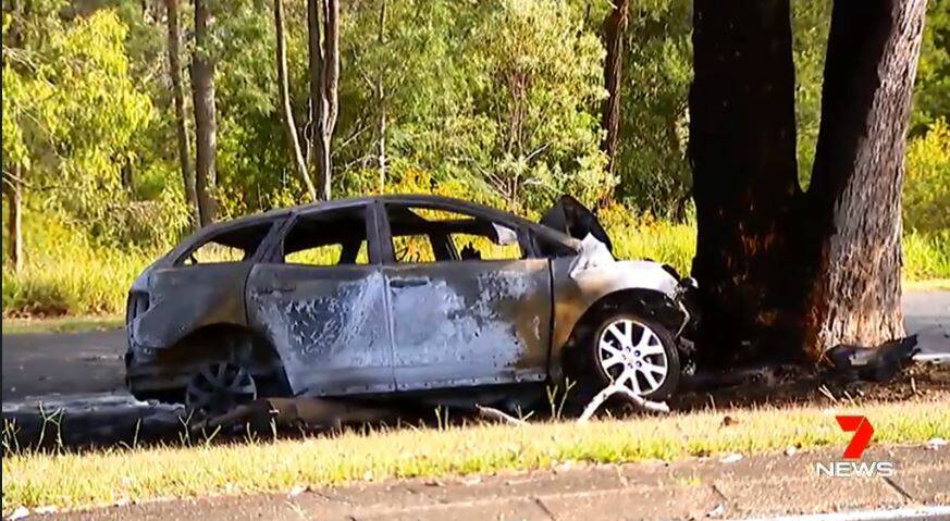 A man died after his car crashed into a tree and caught fire at Inala. Photo: Channel Seven
