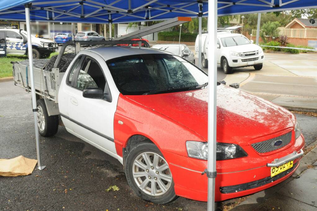Police are appealing for information on distinctive red and white ute, believed to be linked to a suspicious death. Photo: ACT Policing