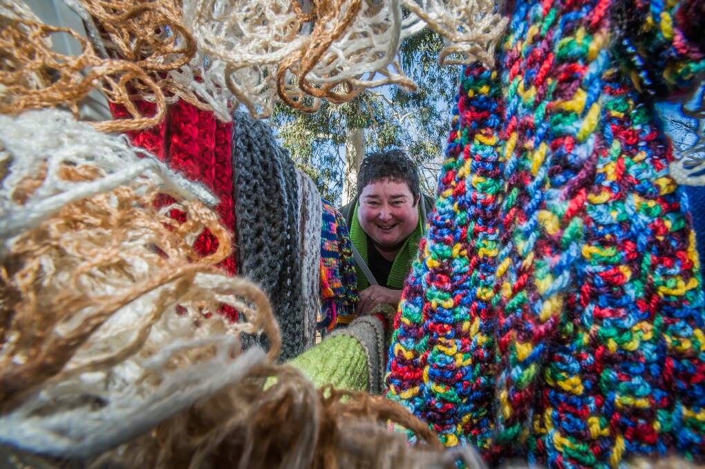 Molly Rhodin, Managing Director of "Down to Earth" practical solutions, has organised a knitting drive which has produced hundreds of knitted items for the Salavtion Army winter appeal. Photo: Karleen Minney