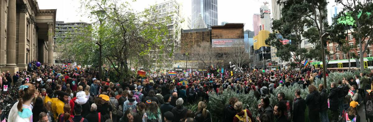 Marriage equality supporters gathered outside the State Library of Victoria. Photo: Tom McKendrick