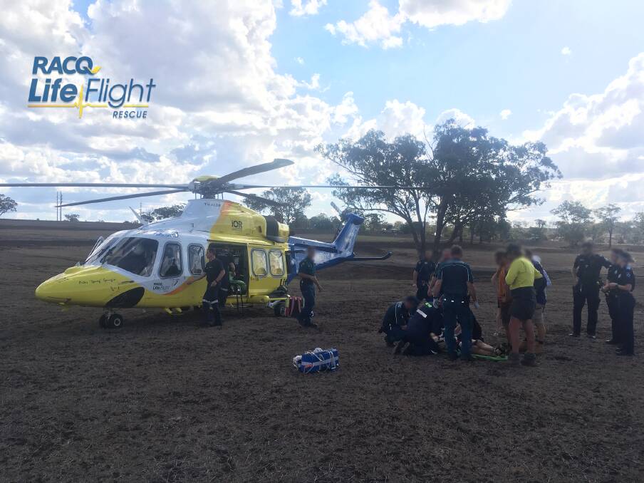 A man in his 20s was being airlifted to hospital after an excavator head had fallen and crushed him in a rural property outside of Toowoomba. Photo: RACQ LifeFlight Rescue