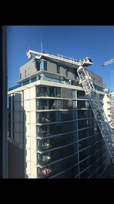 The fallen crane in Wolli Creek before it was removed.  Photo: Hailey Gomes