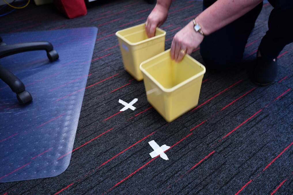 X marks the spot. Masking tape reveals where buckets need to be positioned when it rains Photo: Joe Armao