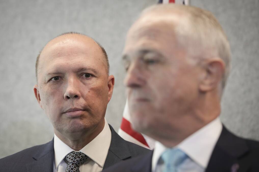 Peter Dutton and Prime Minister Malcolm Turnbull. A series of ministerial resignations will leave many government agencies in a holding pattern. Photo: Alex Ellinghausen