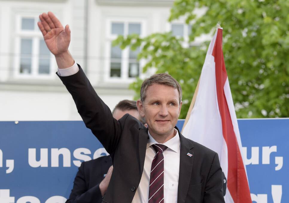 Bjorn Hocke waves during a nationalist Alternative for Germany rally in 2016. Photo: AP.