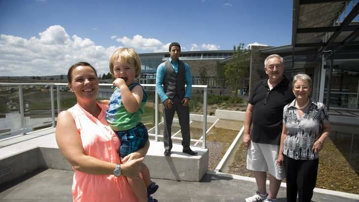 New residents of Googong Samantha Sherd, with son Jake, 2, Simon Azzopardi, and Mark and Annette Pagdin. Photo: Elesa Kurtz